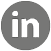 Graues LinkedIn-Logo mit "in"-Buchstaben innerhalb eines Kreises auf weißem Hintergrund.